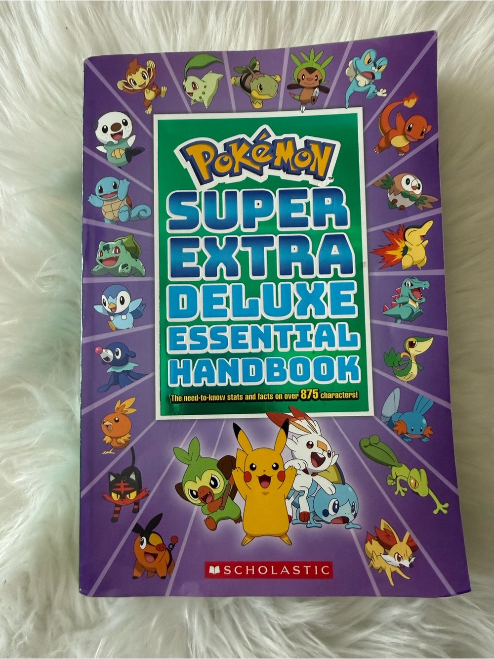 Pokémon Super Extra Deluxe Essential Handbook. Paperback book for Pokémon lovers